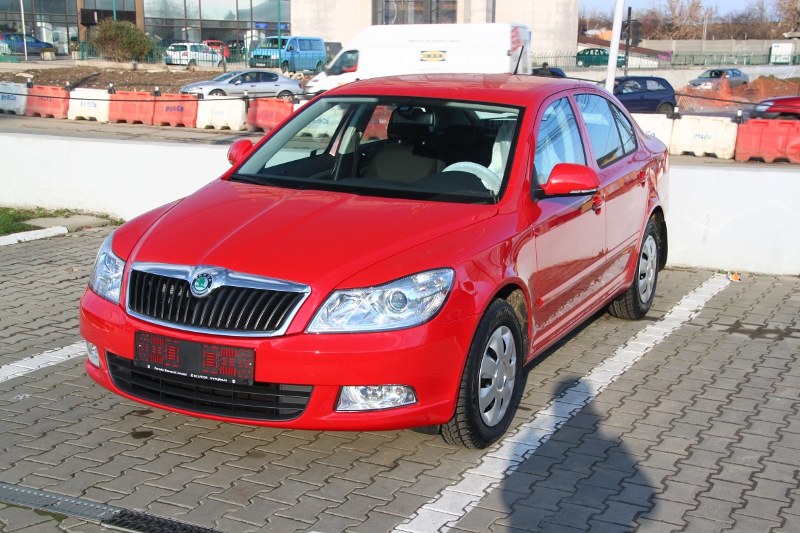  It being our new Skoda Octavia 2 Facelift Still red as our current car 